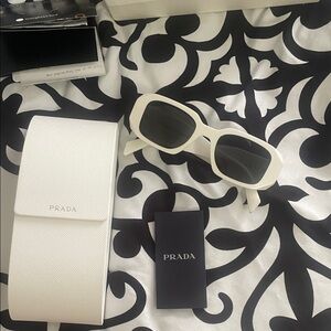 Prada Ivory Sunglasses with Dark Lenses